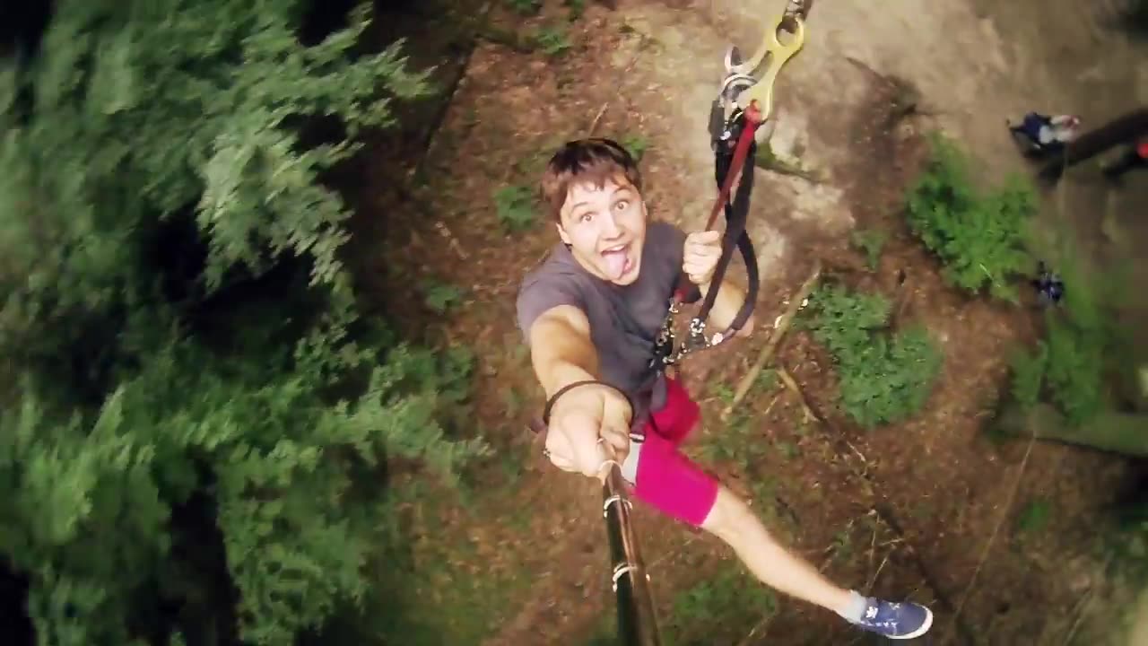 Still from the video: guest swinging on the Big Swing